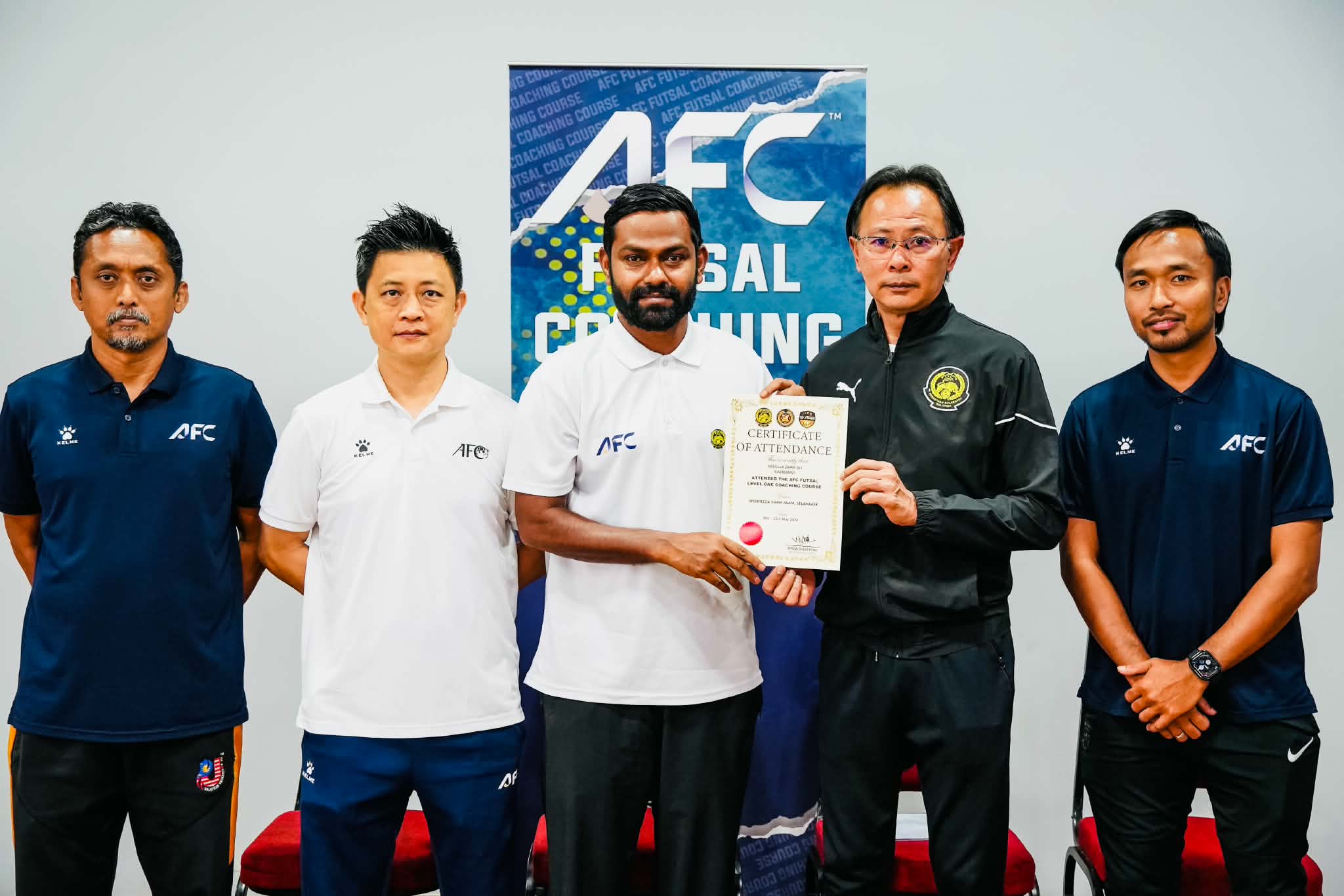 AFC Futsal Coaching Certificate presented to Hussain Rasheed